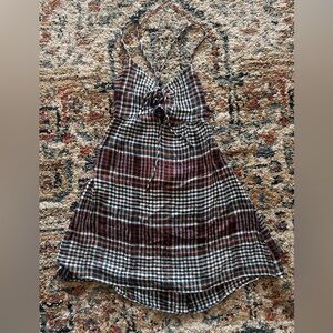 Urban outfitters: Plaid dress, back side bow details for adjusting straps.